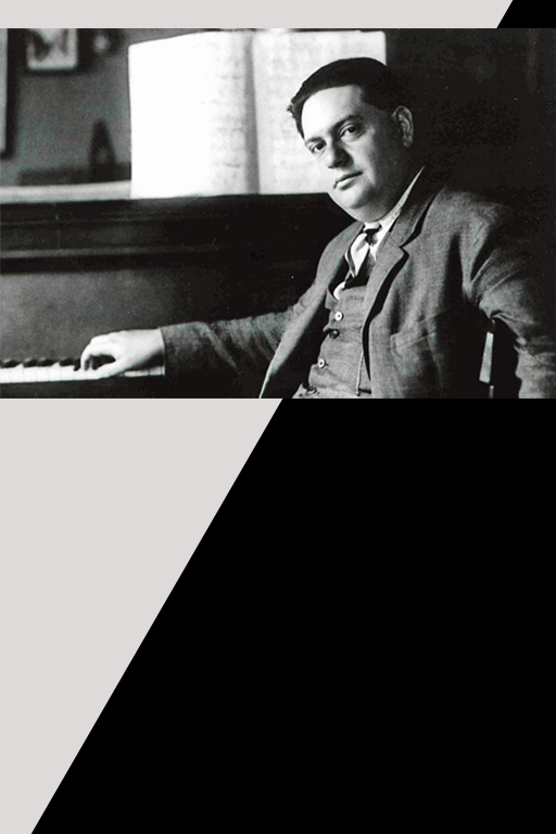 Photo of Darius Milhaud, seated at piano